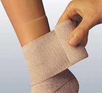 BSN Medical Compression Bandage Comprilan® 4 Inch X 11 Yard Clip Detached Closure Tan NonSterile Standard Compression - Case of 20 - 77188-CS